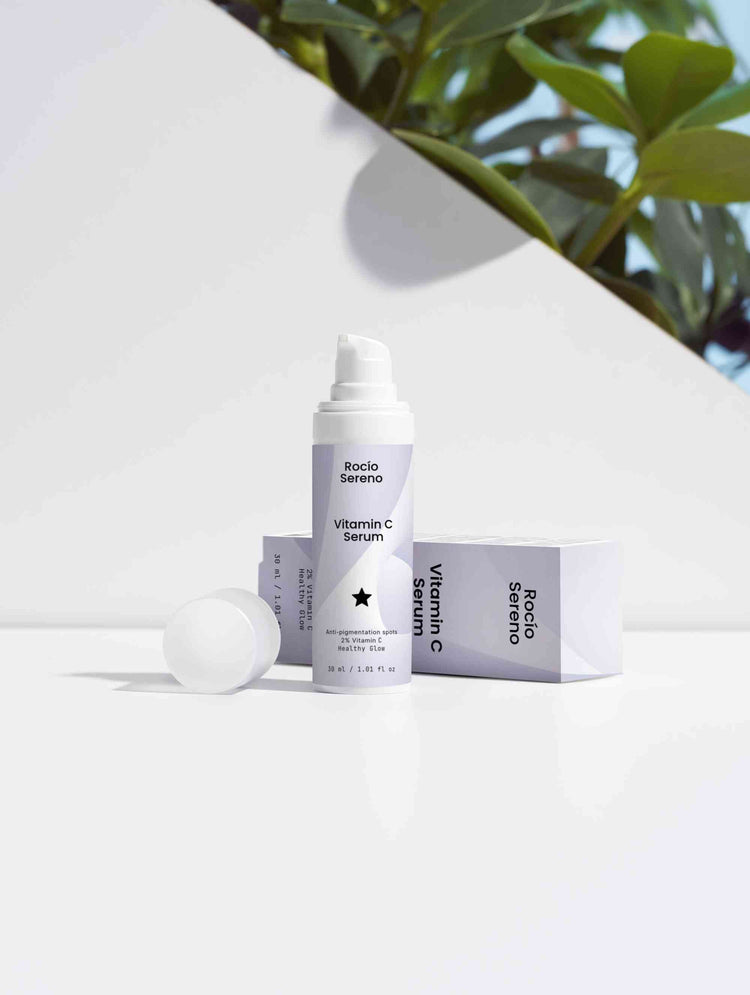 Vitamin C Serum bottle showing 2% natural Vitamin C, Ferulic Acid, and Sea-Buckthorn for radiant, youthful skin protection and hydration.