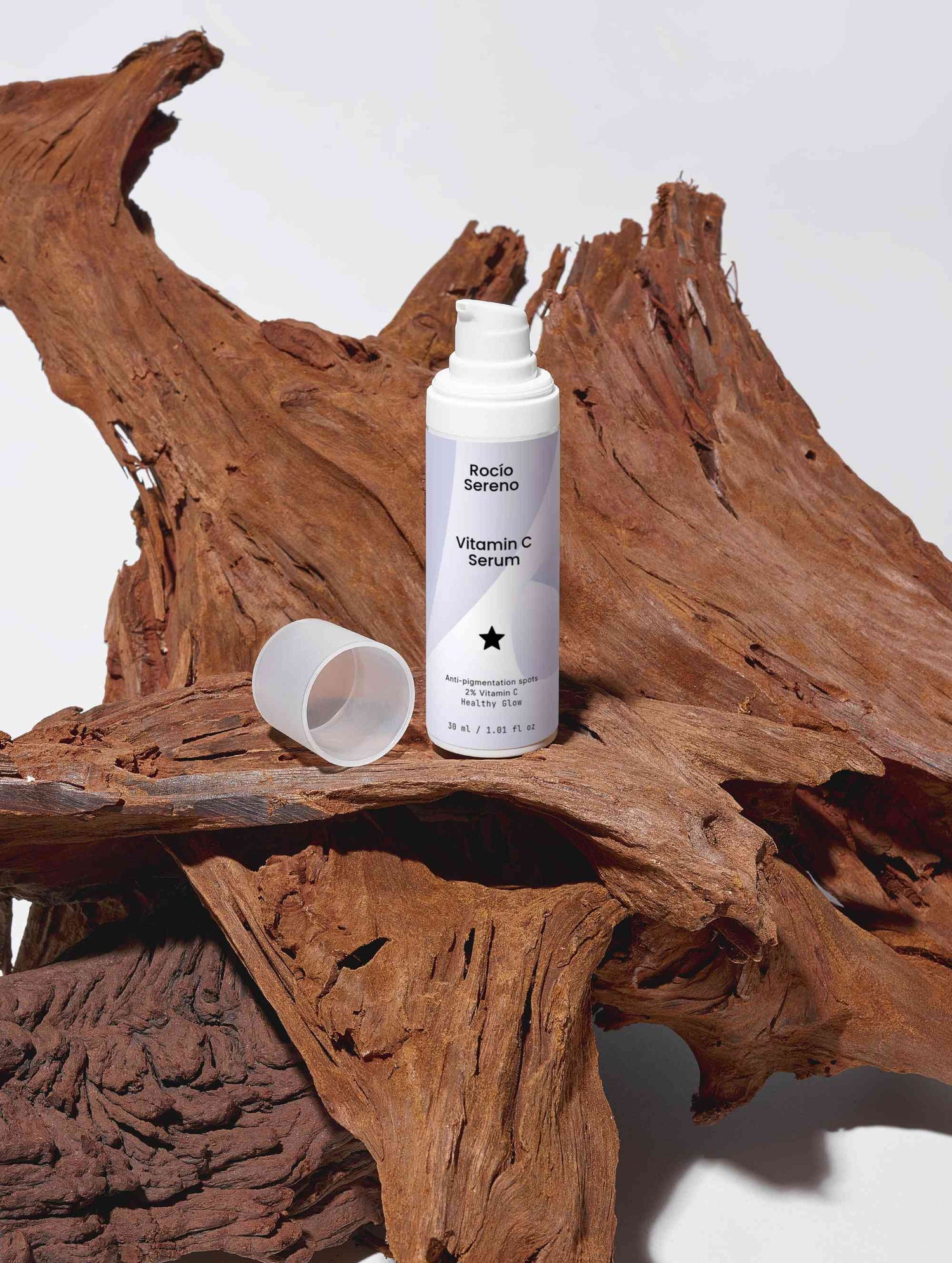 Vitamin C Serum bottle showing 2% natural Vitamin C, Ferulic Acid, and Sea-Buckthorn for radiant, youthful skin protection and hydration.