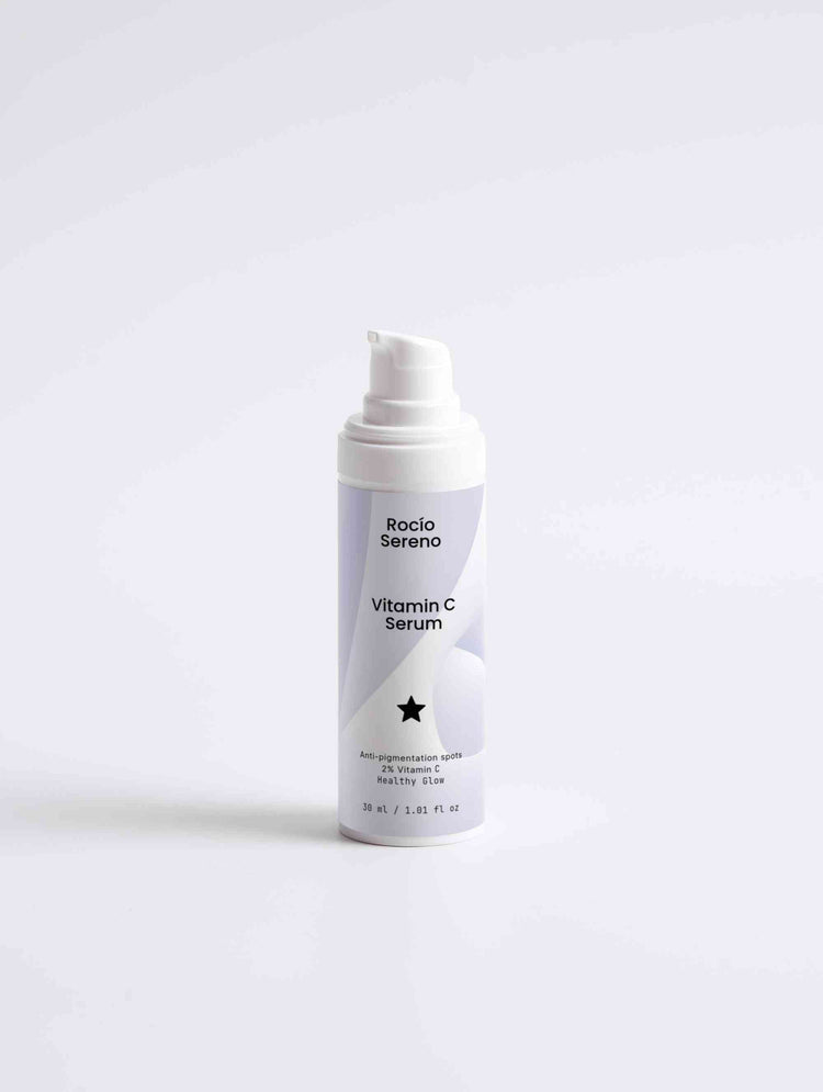 Vitamin C Serum bottle showing 2% natural Vitamin C, Ferulic Acid, and Sea-Buckthorn for radiant, youthful skin protection and hydration.