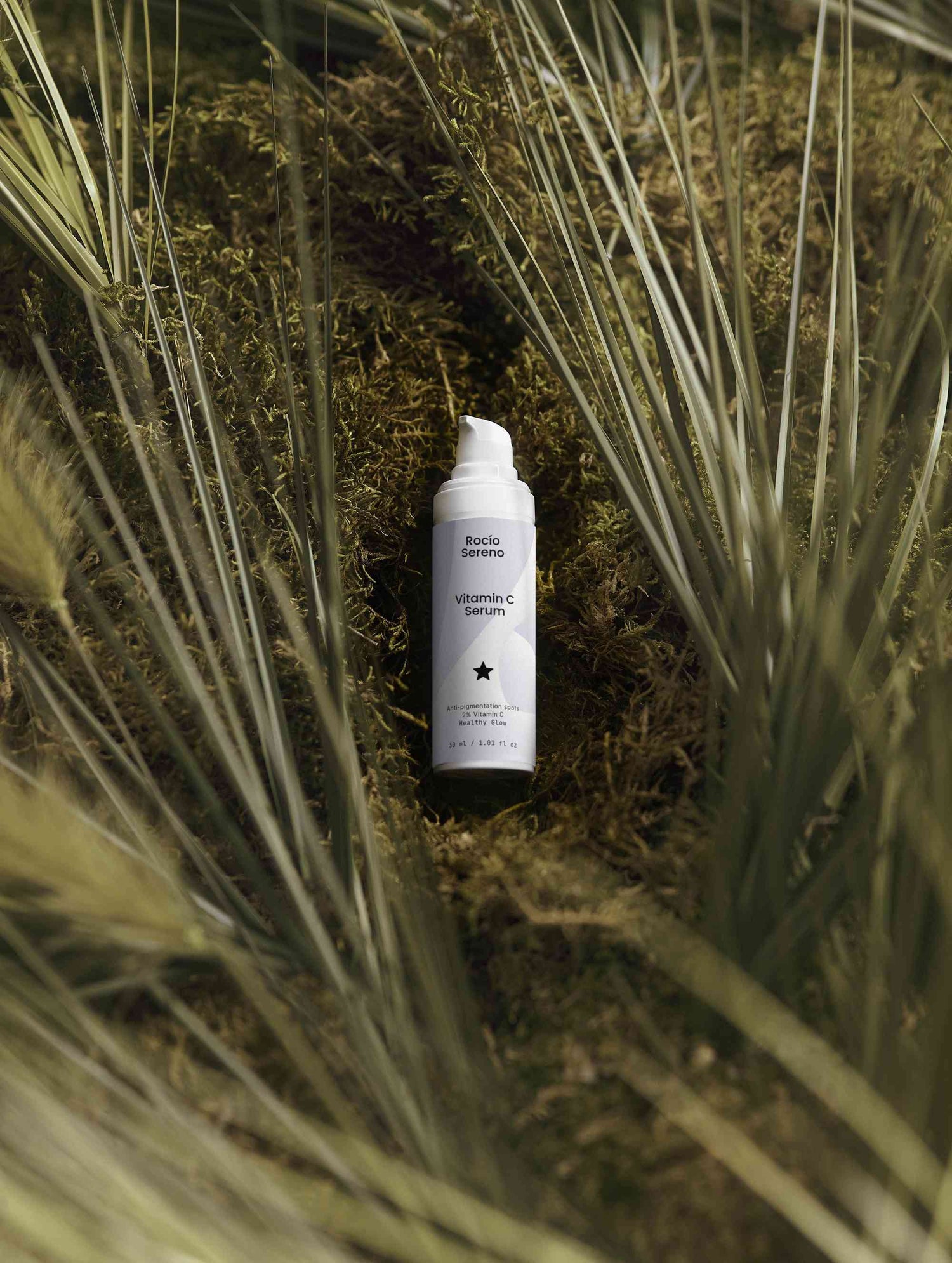 Vitamin C Serum bottle showing 2% natural Vitamin C, Ferulic Acid, and Sea-Buckthorn for radiant, youthful skin protection and hydration.