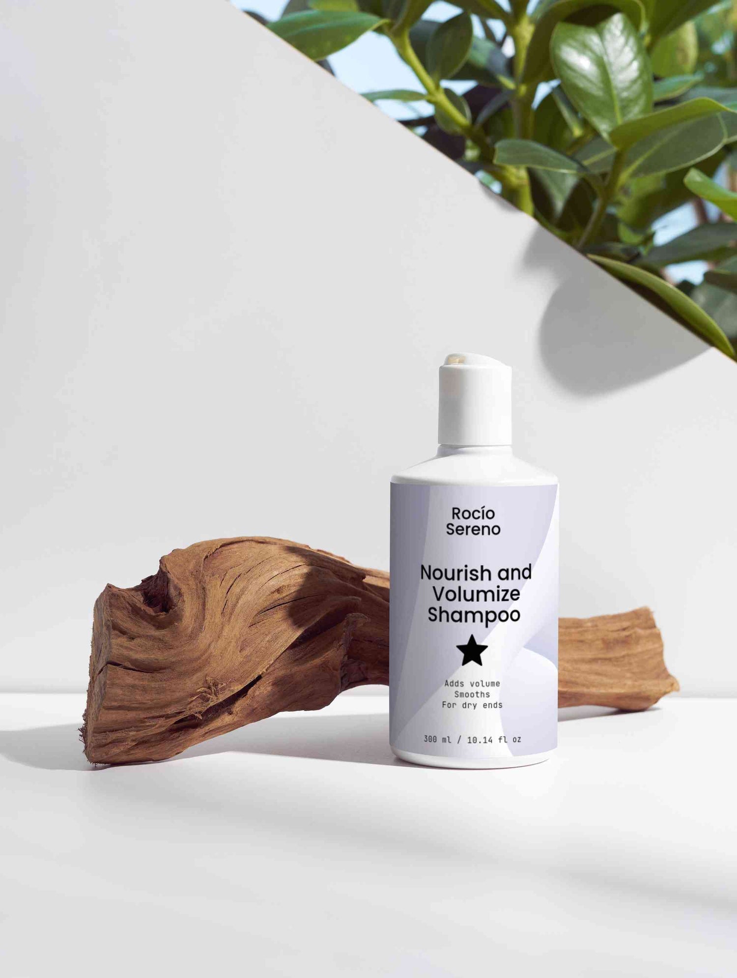 Nourish and Volumize Shampoo bottle with natural ingredients and white packaging for dry ends and volume hair care