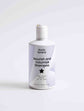 Nourish and Volumize Shampoo bottle with natural ingredients and white packaging for dry ends and volume hair care